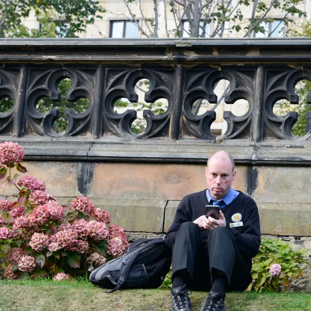 People Sitting While On Their Mobiles — photograph 19 of 25