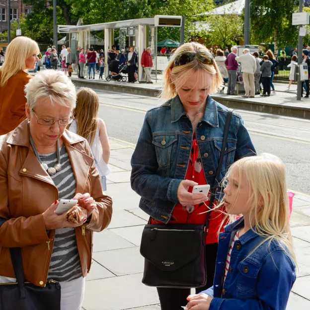 People Standing While On Their Mobiles — photograph 16 of 23