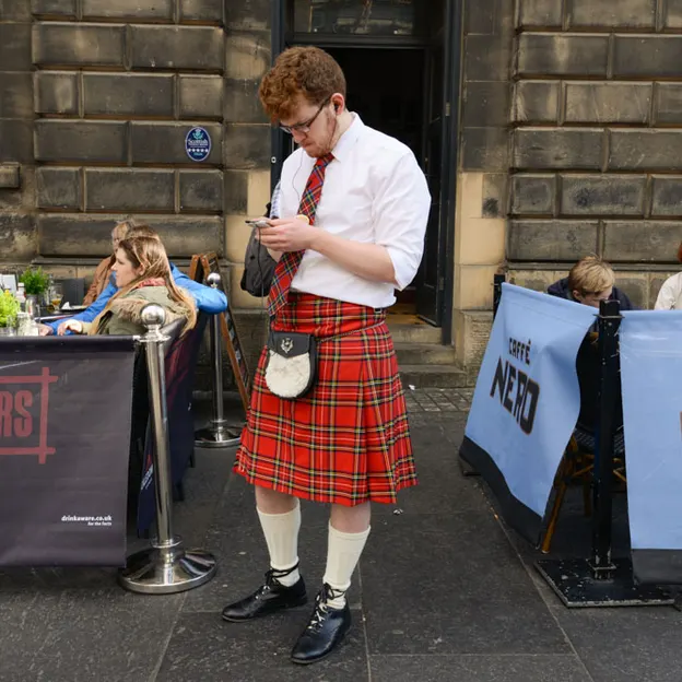 People Standing While On Their Mobiles — photograph 20 of 23