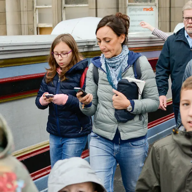 People Walking While On Their Mobiles — photograph 14 of 28
