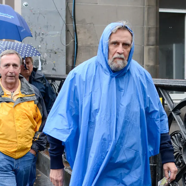 Poncho Wearers — photograph 9 of 12