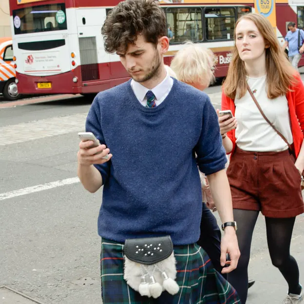 People Walking While On Their Mobiles — photograph 24 of 28