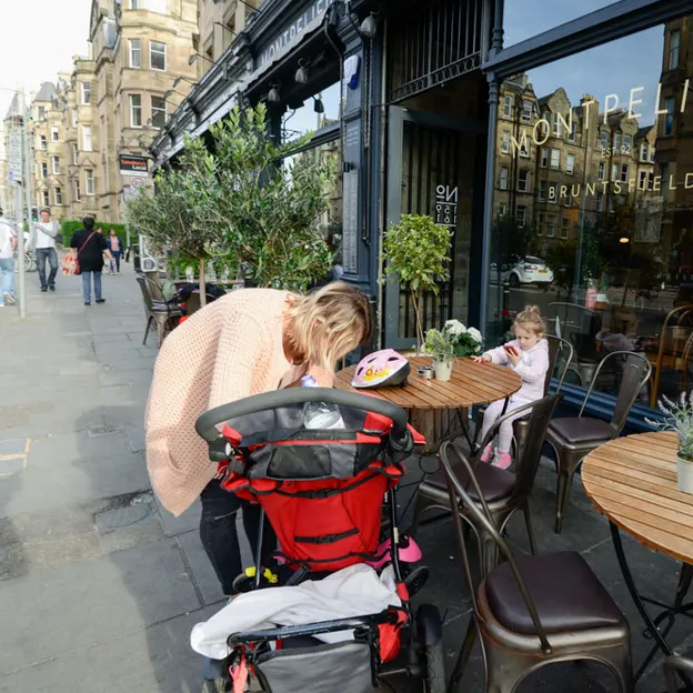 People Sitting While On Their Mobiles — photograph 16 of 25