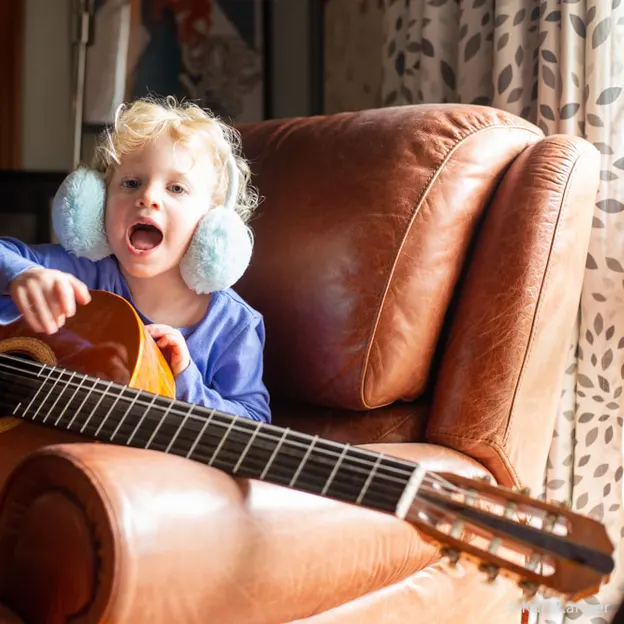 4.4.2020 Heidi playing Guitar — photograph 11 of 12