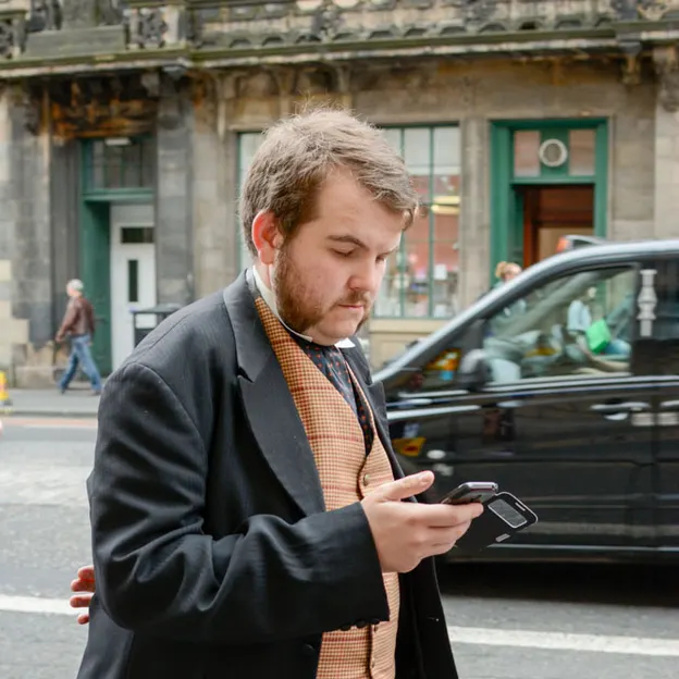 People Walking While On Their Mobiles — photograph 12 of 28