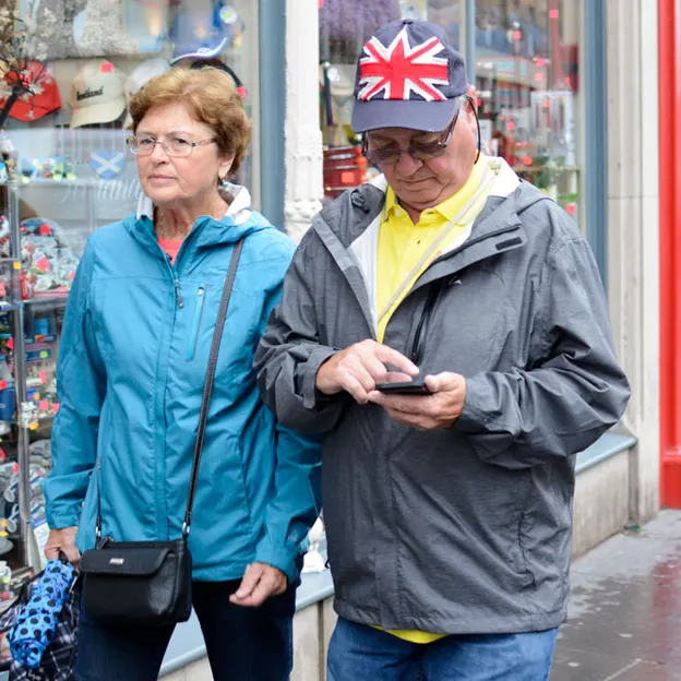 People Walking While On Their Mobiles — photograph 13 of 28
