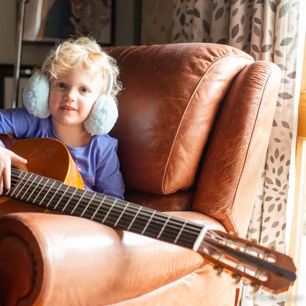 4.4.2020 Heidi playing Guitar — photograph 9 of 12