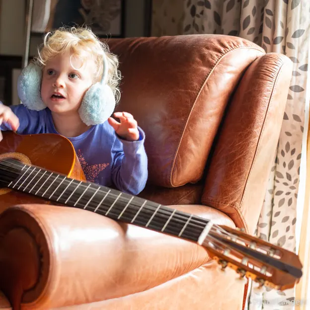 4.4.2020 Heidi playing Guitar — photograph 10 of 12