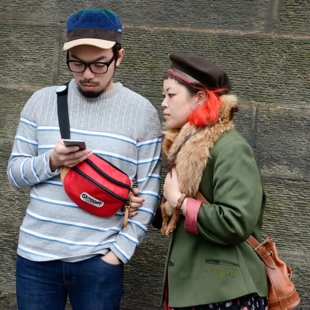 People Standing While On Their Mobiles — photograph 19 of 23