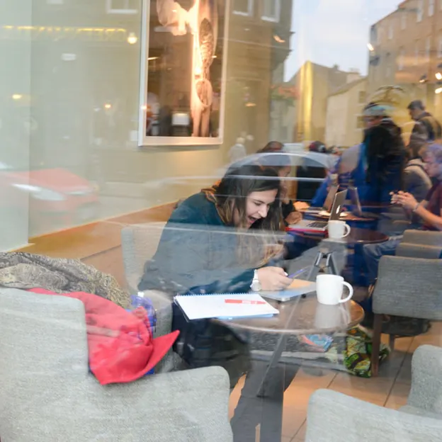 People Sitting While On Their Mobiles — photograph 18 of 25
